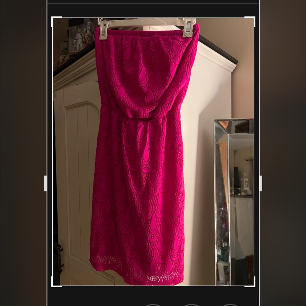 Lilly Pulitzer pink lacey dress above the knee. Strapless.